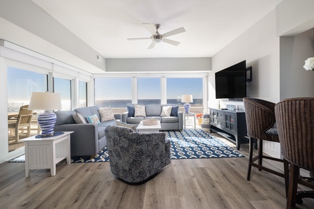Walk from the kitchen to your bright, oceanfront living room