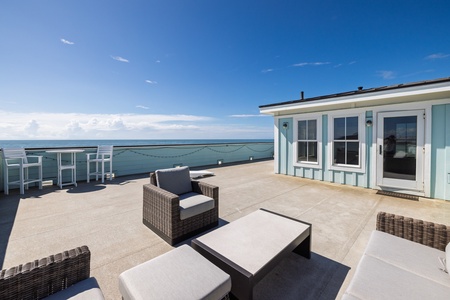 The rooftop deck offers an abundance of seating and space to gather with friends and family