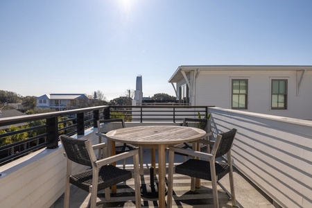 Step onto your private rooftop terrace where morning coffee tastes better surrounded by neighborhood views and coastal breeze.