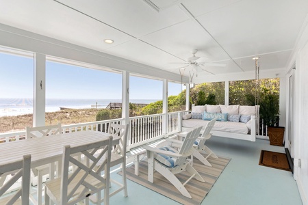 Your large private screened-in porch has tons of seating