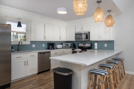 Beautiful lighting and modern appliances accent your kitchen