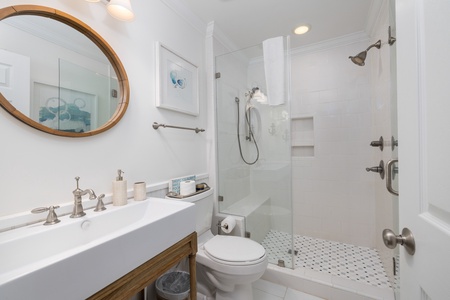 Your queen and twin rooms share this beautiful bathroom with tile walk-in shower