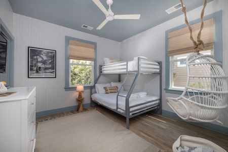 Your kids will love the bunk room with this twin-over-full bunk bed