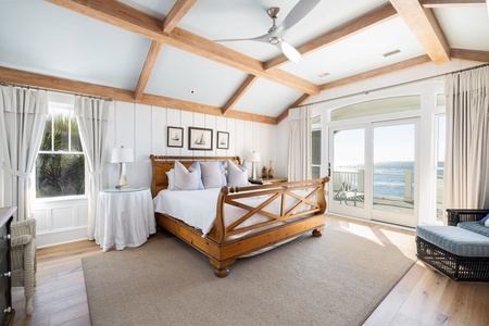 Wake up to stunning views of the ocean from your bed
