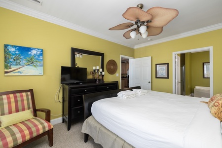 Your primary bedroom has a comfortable king size bed