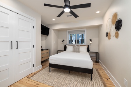 Your fourth bedroom features a queen size bed and has access to the hall bathrooms