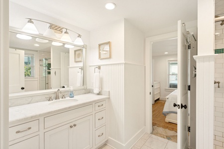 Bedrooms #3 and #4 have access to the jack-and-jill bathroom with shower and large vanity