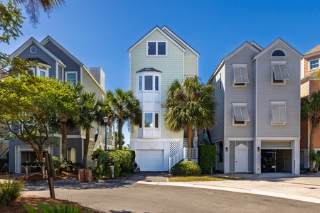Welcome to Pavilion Paradise, a stunning 6-bedroom, 6-bathroom beachfront vacation home in the heart of Wild Dunes Resort