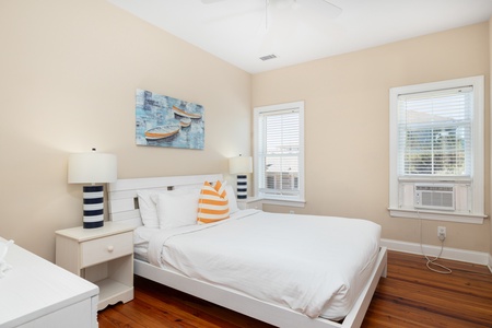 Your second queen bedroom is a cozy space to relax after a day on the water