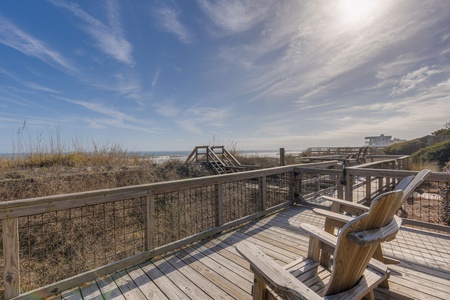 Take the private boardwalk to the beach