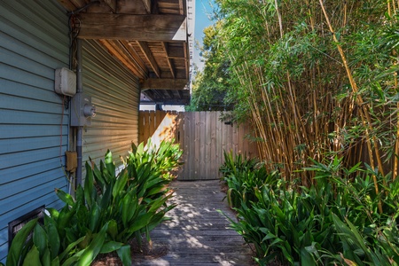 A lush pathway leads you to your backyard