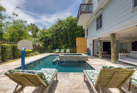 Comfortable lounge chairs and easy access from the home to the pool deck.