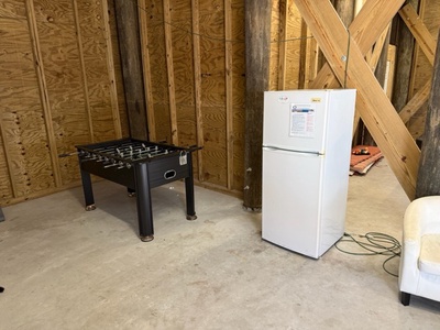 Challenge friends to foosball matches in your private game area, complete with mini-fridge for refreshments.