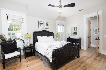 The main level queen bedroom features an en suite bathroom