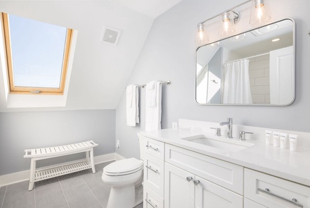 Hall bath includes a walk-in shower.