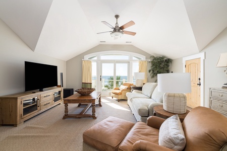 The upstairs features its very own sitting room with a balcony