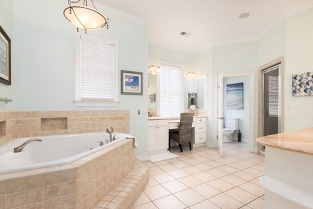 Indulge in the large jacuzzi tub in your upstairs primary bathroom