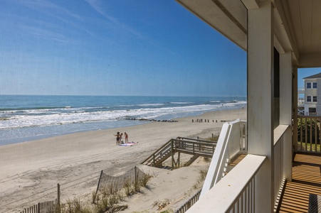 Step onto your private balcony and breathe in the ocean air as endless waves stretch before you.