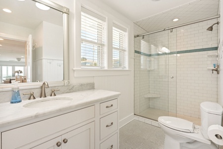 Sunshine By The Sea features a full bathroom on the main floor