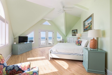 Wake up in your stunning third floor primary king bedroom