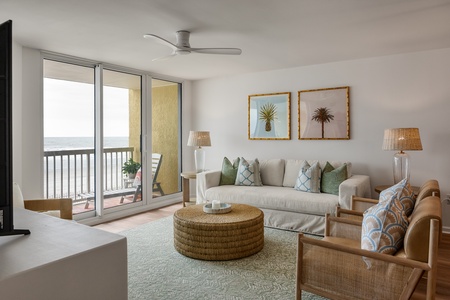Sink into coastal life in your naturally-lit living room