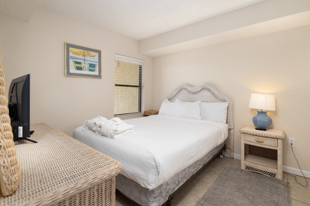 Relax in your coastal queen bedroom