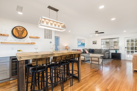 At the top of the stairs you'll find your wet bar with high-top seating