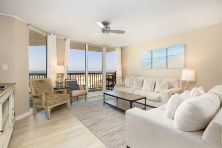 Sink into plush white sofas in your luxurious living space