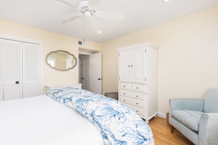 Unwind in your serene bedroom with crisp linens and a TV for peaceful evenings.