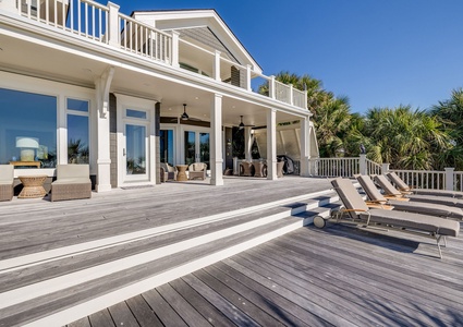 Your deck is multi-level and takes you down to your pool