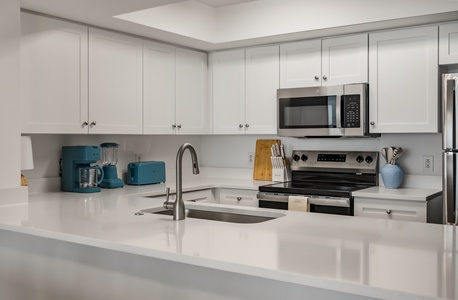 Your fully equipped kitchen makes preparing meals effortless with modern appliances and plenty of counter space for cooking together.