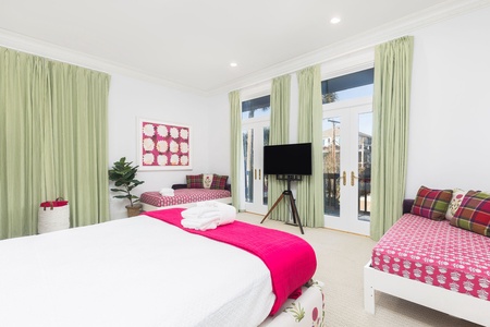 Your downstairs queen bedroom overlooks the front of the house