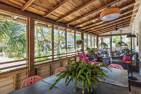 Step into your coastal screened-in front porch