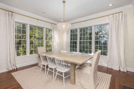 Gather around this bright dining room where your group can share memorable meals together.