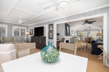 Beyond the living room is your large sunroom with access to your back deck