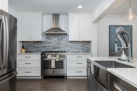 Cook dinners on your professional grade range with stainless steel vent hood