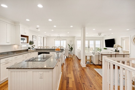 Enter Sunshine By The Sea to your bright, open concept living space
