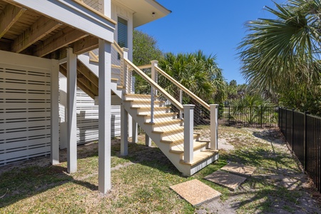 Take the wooden steps up to your outdoor dining area