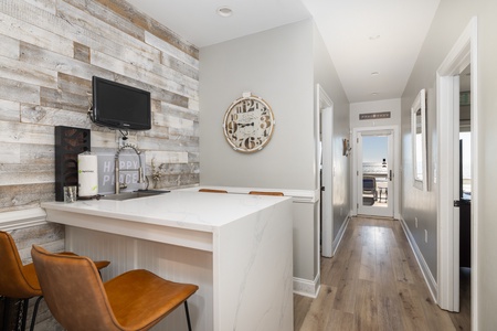 Gather around the downstairs breakfast bar