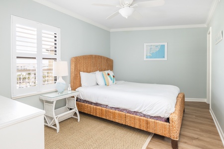 The queen bedroom is located streetside