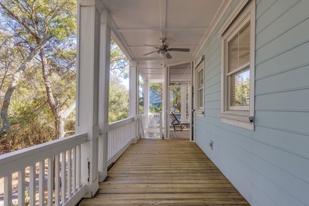 Just off the primary downstairs porch is a private path leading to beach access