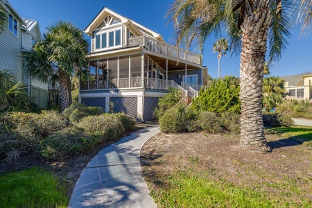 Welcome to Second Wind, a coastal beach house nestled among a tropical landscape