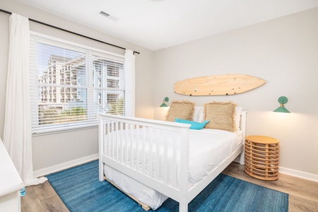 Full size bed with twin trundle.