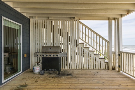 Your covered deck has a grill for outdoor cooking