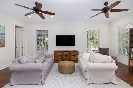 Your spacious sitting room with cozy seating.