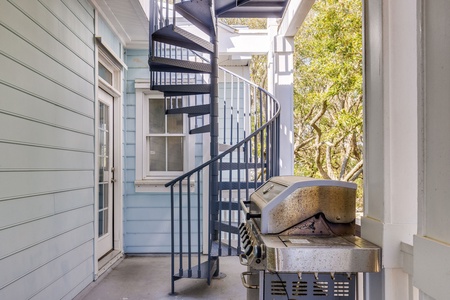 Take the spiral staircase up to the rooftop deck