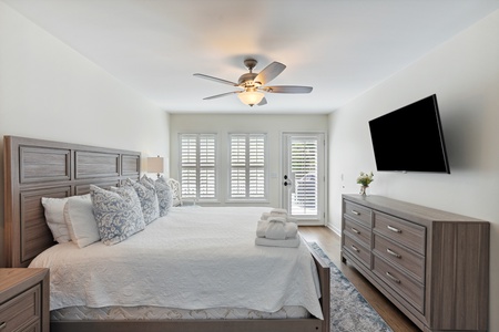 Relax in your tranquil primary king bedroom
