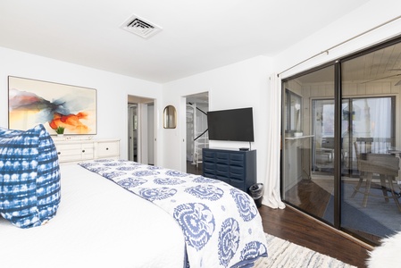 Your primary king bedroom has direct access to the screened in patio