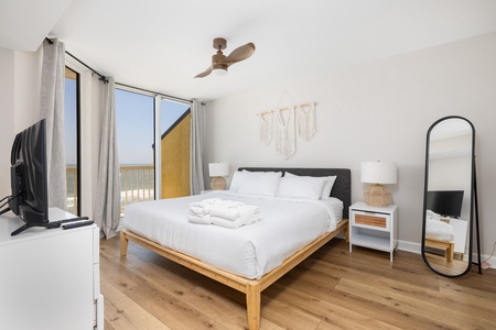 Your primary bedroom features a king bed, views of the ocean, and an en suite bathroom