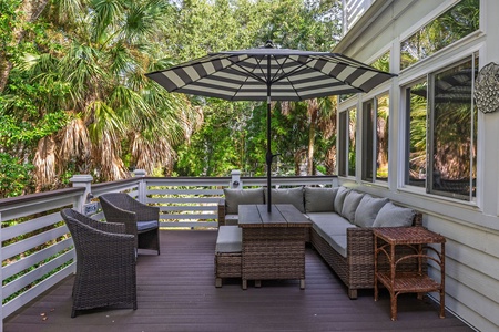 Relax in style on the shaded deck – perfect for morning coffee or evening cocktails.
